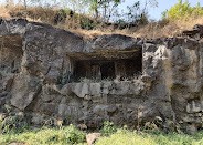 Tapovan Caves — rock-cut meditation caves on forested hilltop above Deoghar, Jharkhand